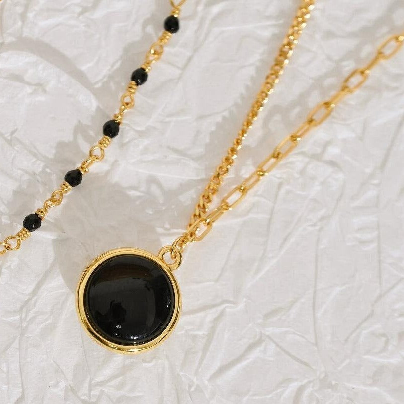 Dual-Sided Yin Yang Necklace: Mother of Pearl & Black Agate Elegance