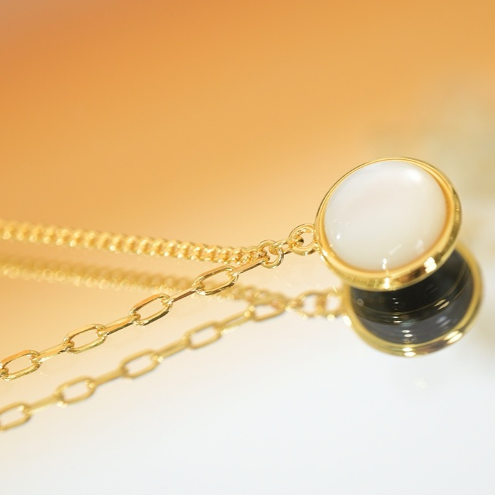 Dual-Sided Yin Yang Necklace: Mother of Pearl & Black Agate Elegance